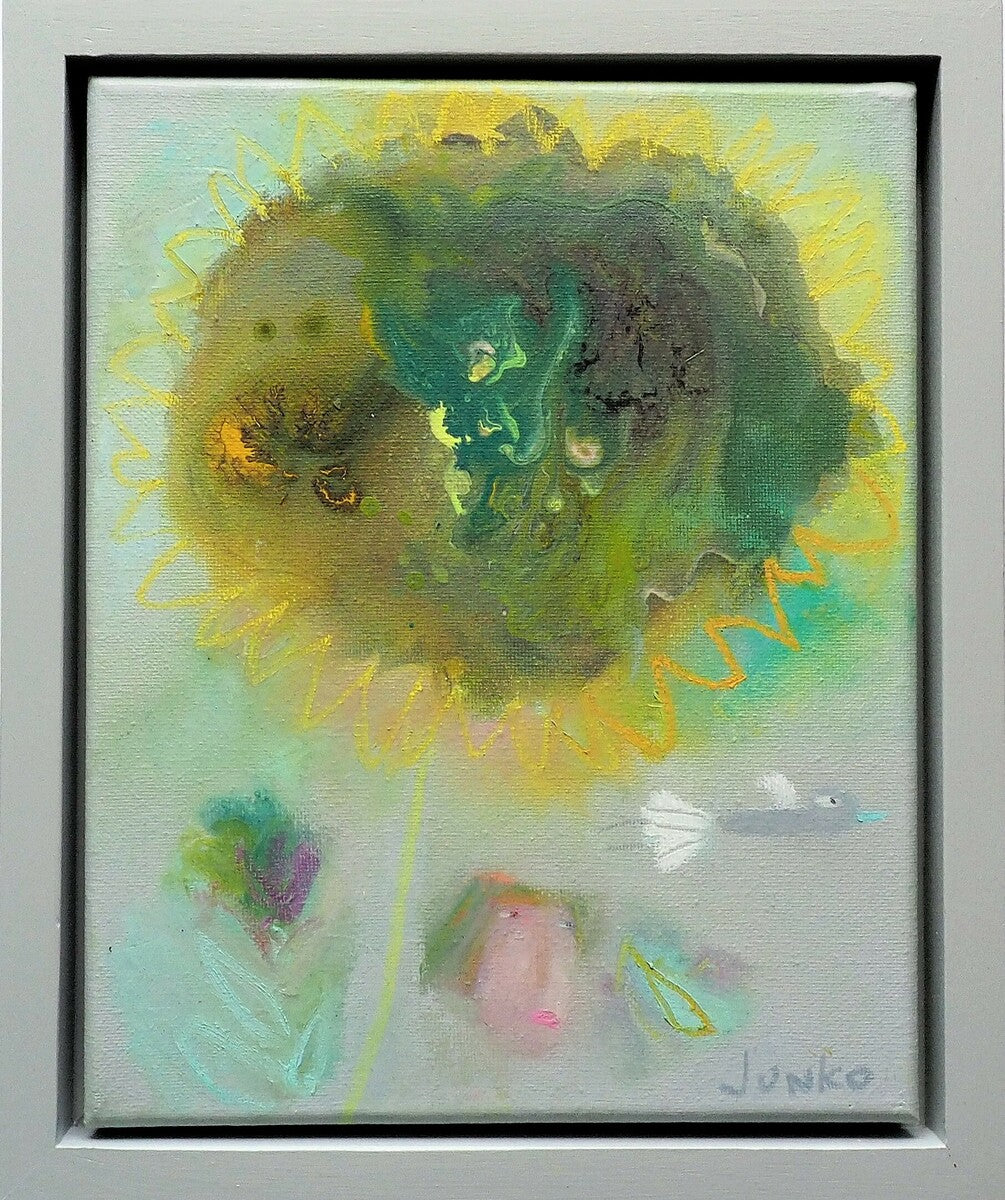Junko Go | Standing big and tall is a sunflower. We often fancy ourselves...