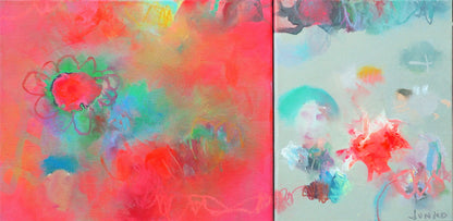 There are fairies in a little pot of growing flowers....