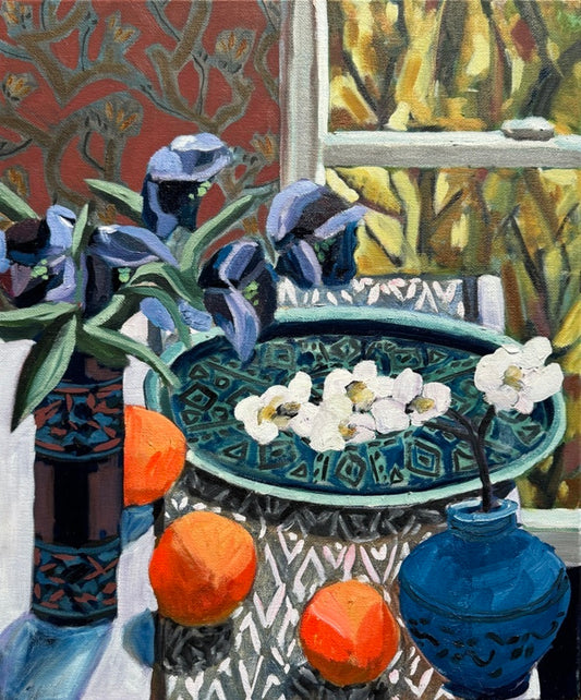 Blue Dish on a Table with Oranges and Orchid